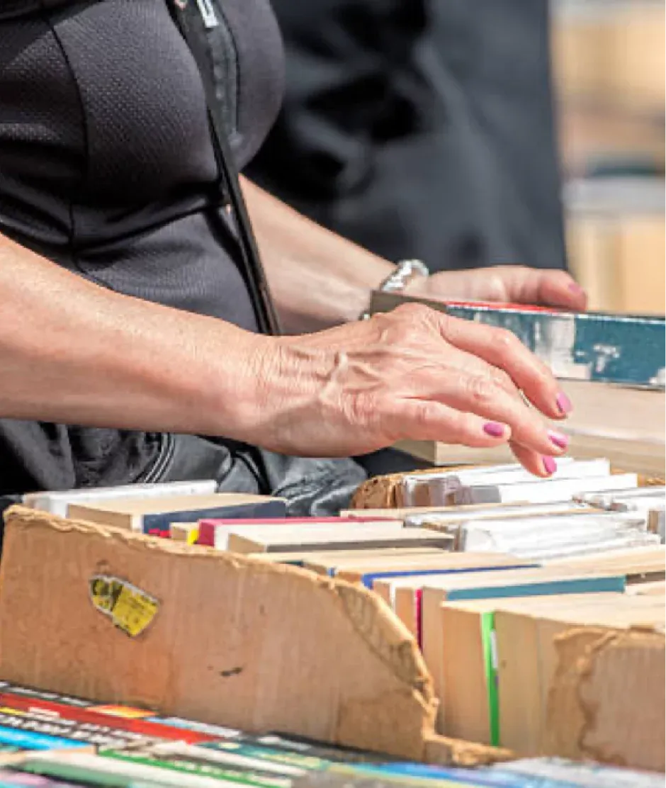 persons hand browsing cards