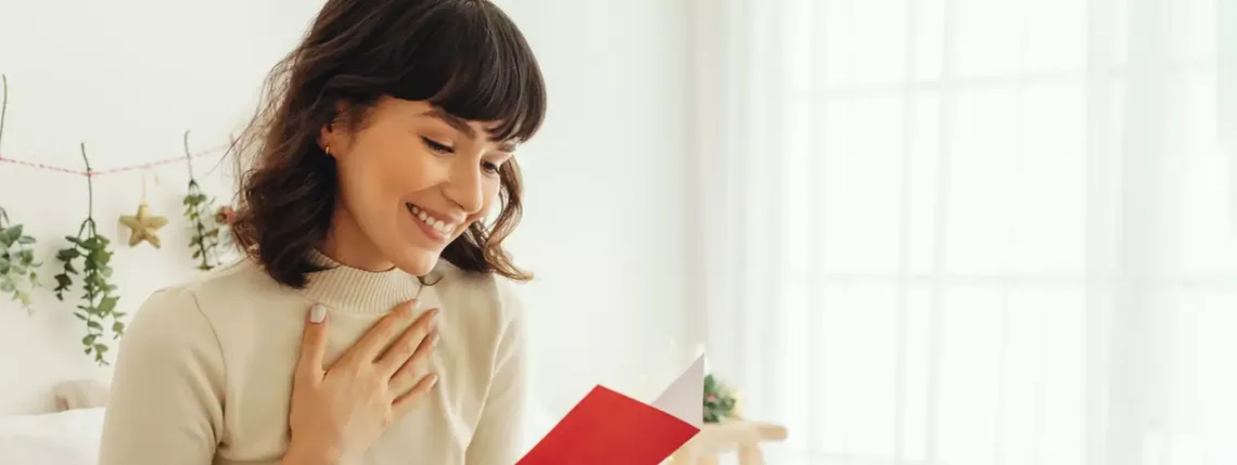 woman receiving a card